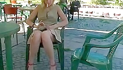 Russian blonde poses naked on public terrace Russian blonde poses naked on public terrace